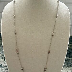 EUC Kate Spade Silver Colored Take a Bow and NY Logo Necklace. No flaws!